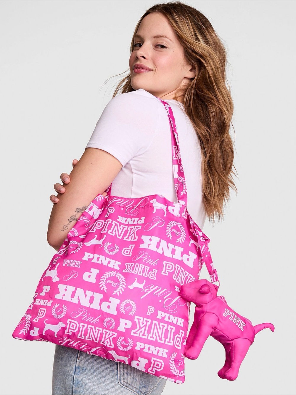 PINK Victoria's Secret Bright Pink Logo Packable Tote Bag fits into Dog.